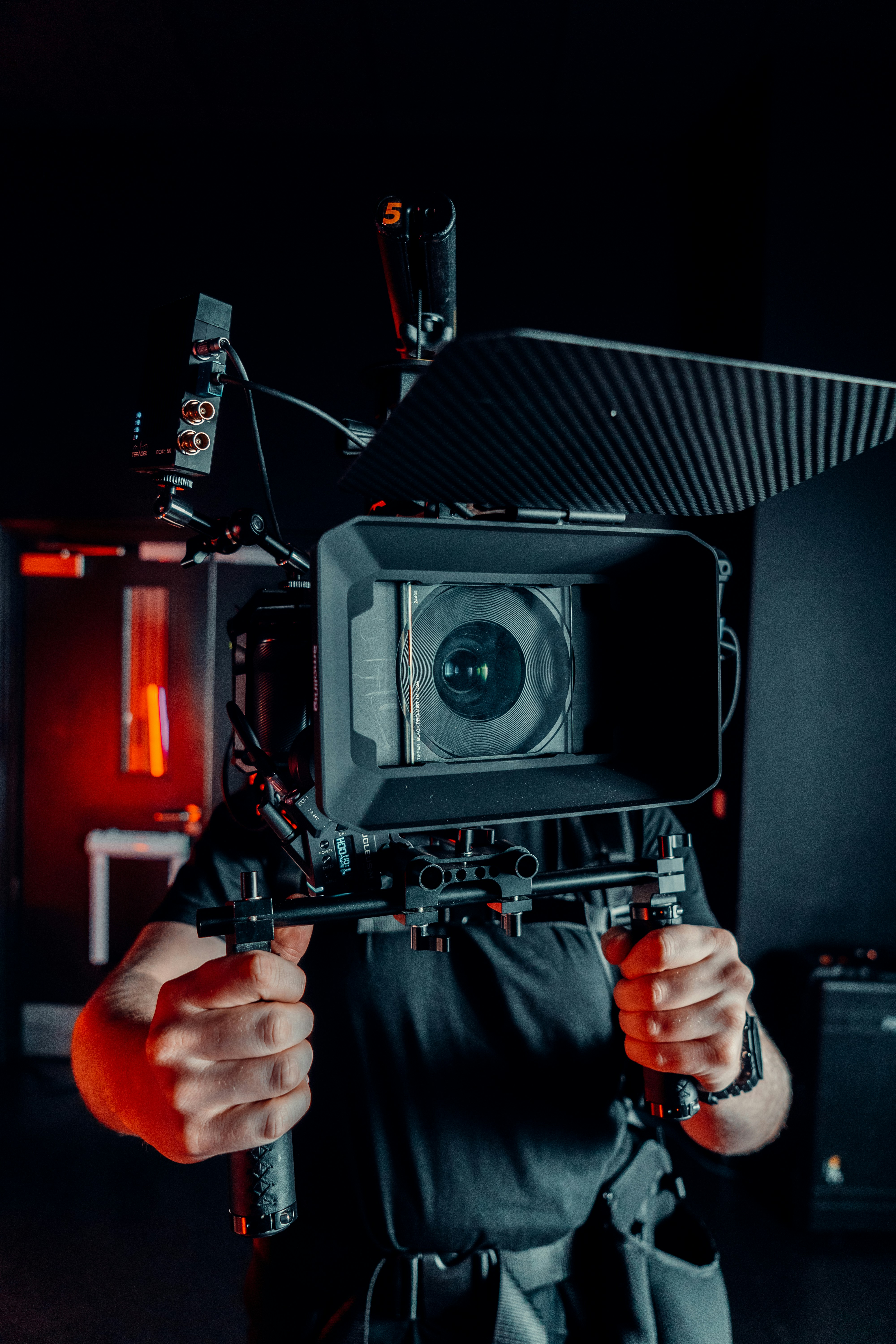 Filmmaker behind camera